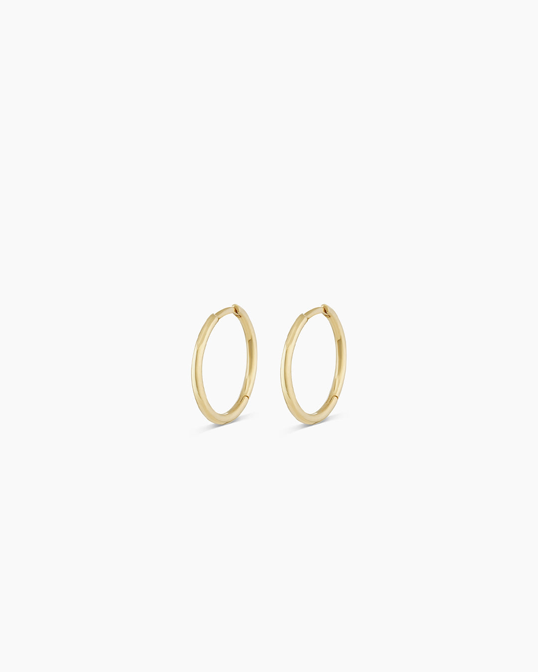 Woman wearing Classic Gold Huggie || option::14k Solid Gold, 11mm, Pair